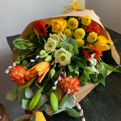 Lemon & Lime - A beautiful collection of flowers simply wrapped and ready to arrange.