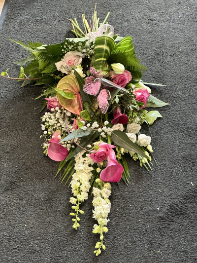 Single Ended Spray SYM-303 - This single ended spray is made using a mix of pink and white flowers. Same day delivery may not be possible on this design – please contact us to discuss your requirements.