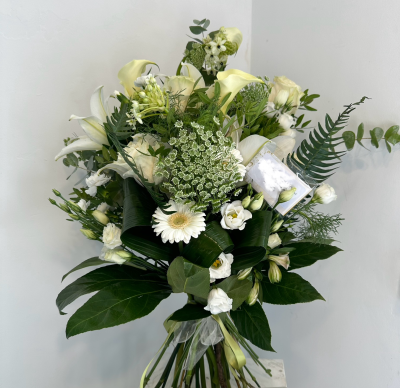 Tied Sheaf SYM-338 - This beautiful, tied sheaf is made using white and green flowers for the ideal tribute.