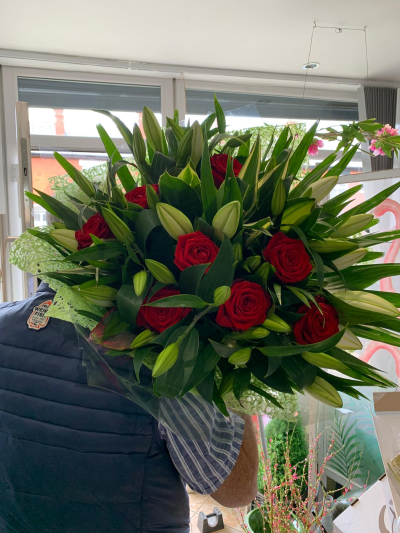 For my love - Eco friendly romantic handtie in water. Red roses and white lillies with lush green foliage