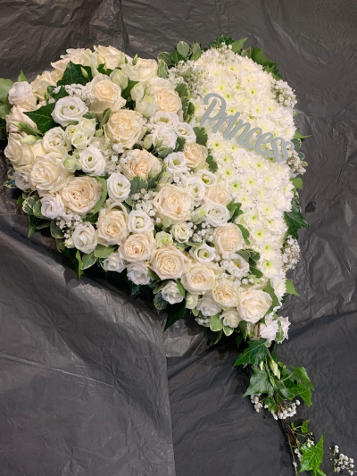 Funeral heart - 21 inch heart . Part massed /part white and cream roses with gyp and lizanthus