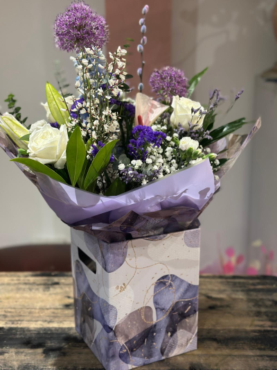 Cool Breeze - This classical stylish collection of flowers, make this hand tied the perfect gift. Flowers professionally arranged and delivered by a local florist.