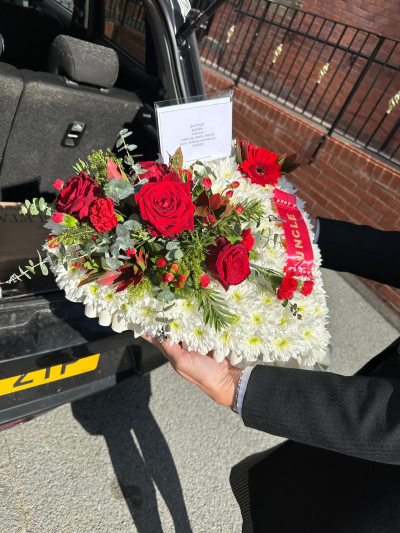 White based heart - White based heart with a spray of red flowers and a personalised ribbon