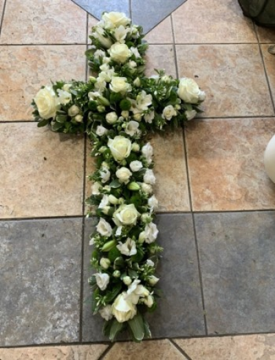 4ft classic white cross - 4ft classic white cross in mixed seasonal white flowers to include roses.