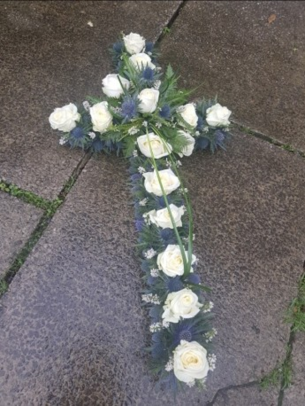 Cross Blue thistle and white roses