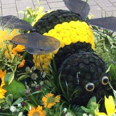 Mr Bee - Fabulous designer board of garden flowers with Mr. Bee buzzing around. Large tribute.